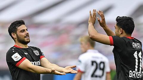 Kevin Volland (l) brachte Leverkusen beim Sieg gegen Mainz in Führung.