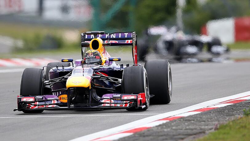 Sebastian Vettel beim Freitagstraining auf dem Nürburgring. Sebastian Vettel beim Freitagstraining auf dem Nürburgring.