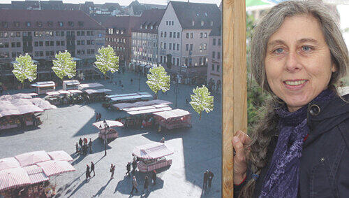Der Hauptmarkt soll grüner werden: Ingrid Treutter vom Bund Naturschutz vor einer Fotomontage mit den Bäumen im Zentrum. Der Hauptmarkt soll grüner werden: Ingrid Treutter vom Bund Naturschutz vor einer Fotomontage mit den Bäumen im Zentrum.