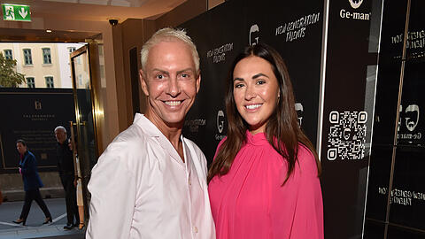 André Schulz mit TV-Star Carina Wild bei einem Charity-Dinner in München