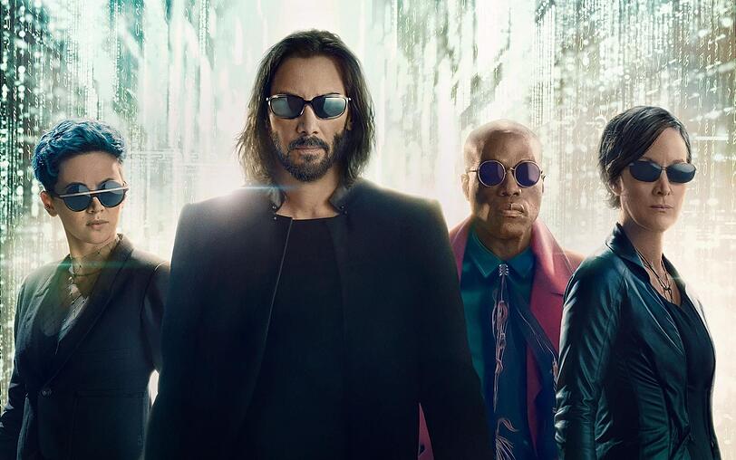 Mit "Matrix Resurrections", dem vierten Film der Reihe, taucht das Publikum noch einmal in die doppelbödige Welt von Neo (Keanu Reeves, zweiter von links) und Co. ein. Mit "Matrix Resurrections", dem vierten Film der Reihe, taucht das Publikum noch einmal in die doppelbödige Welt von Neo (Keanu Reeves, zweiter von links) und Co. ein.