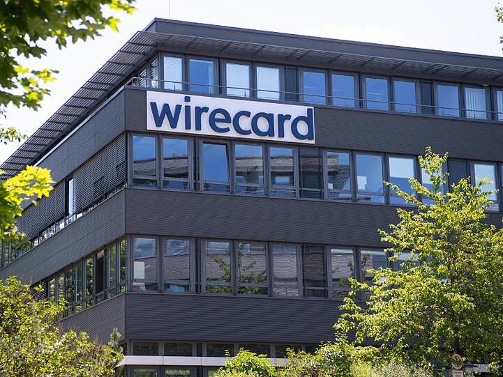 Der Schriftzug von Wirecard ist an der Firmenzentrale des Zahlungsdienstleisters zu sehen. Foto: Sven Hoppe/dpa