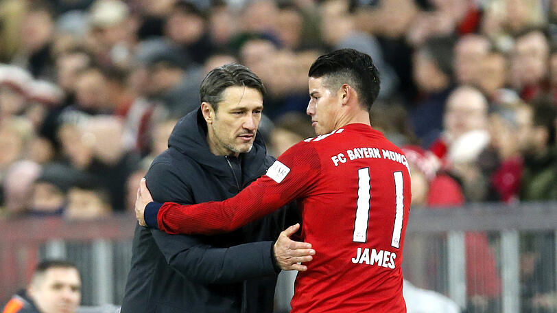 Abklatschen nach der Partie: Bayern-Trainer Niko Kovac (l.) und James Rodríguez.
