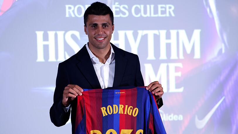 Spaniens Weltmeister Rodri spielt künftig für den FC Barcelona. Spaniens Weltmeister Rodri spielt künftig für den FC Barcelona.