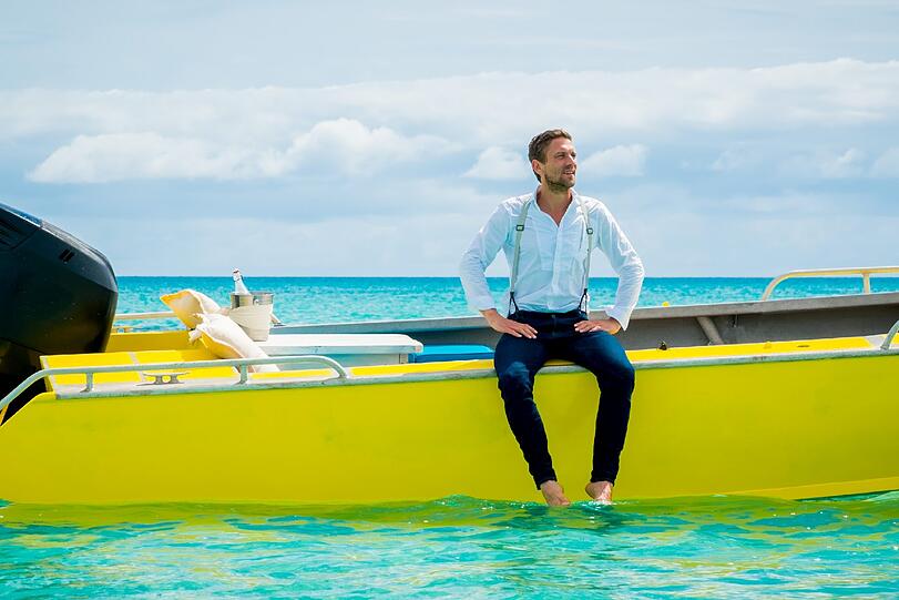 Moderator Peer Kusmagk ist auf dem Weg zur Insel der Versuchung.