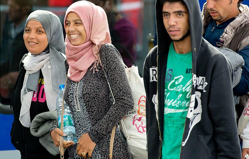 Flüchtlinge kommen am Hauptbahnhof München an.
