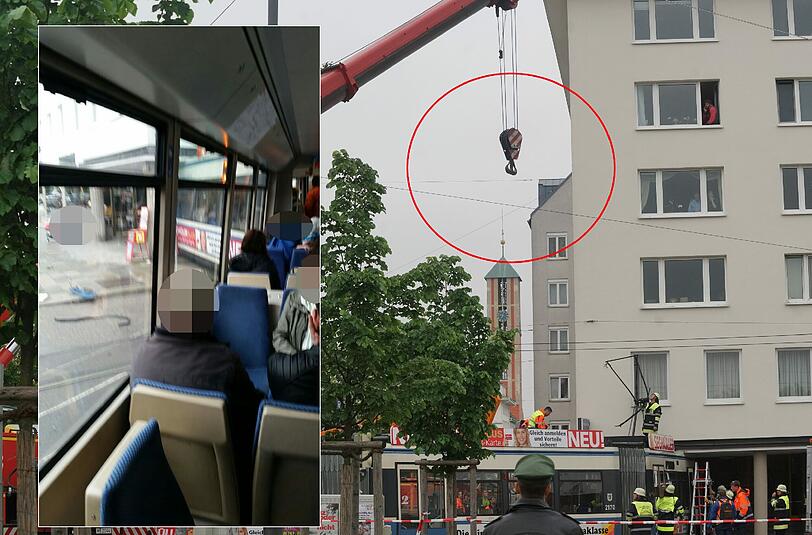 Nach dem Tram-Unfall in der Gabelsbergerstraße versucht die Feuerwehr, die Bahn mit einem schweren Kran anzuheben.