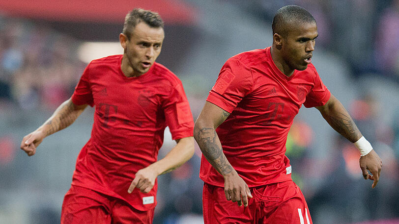Wollen auch im brasilianischen Nationaltrikot gemeinsam wirbeln: Die Bayern-Profis Rafinha (links) und Douglas Costa.