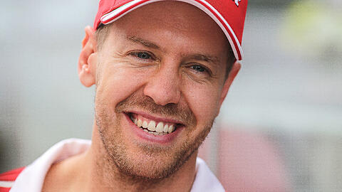 Kann schon wieder lachen: WM-Verlierer Sebastian Vettel.