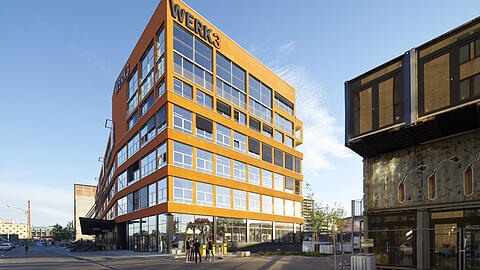 Das Herzstück des Werksviertels ist das orange Werk 3 im ehemaligen Pfanni-Produktionsgebäude.