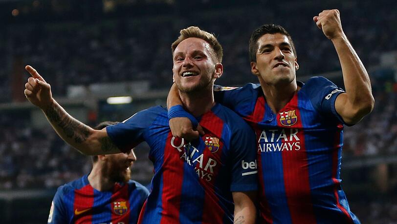 Ivan Rakitic (l) und Luis Suarez vom FC Barcelona. Dass Rakitic zum FC Bayern kommen könnte - ein ziemlich wildes Gerücht. Ivan Rakitic (l) und Luis Suarez vom FC Barcelona. Dass Rakitic zum FC Bayern kommen könnte - ein ziemlich wildes Gerücht.