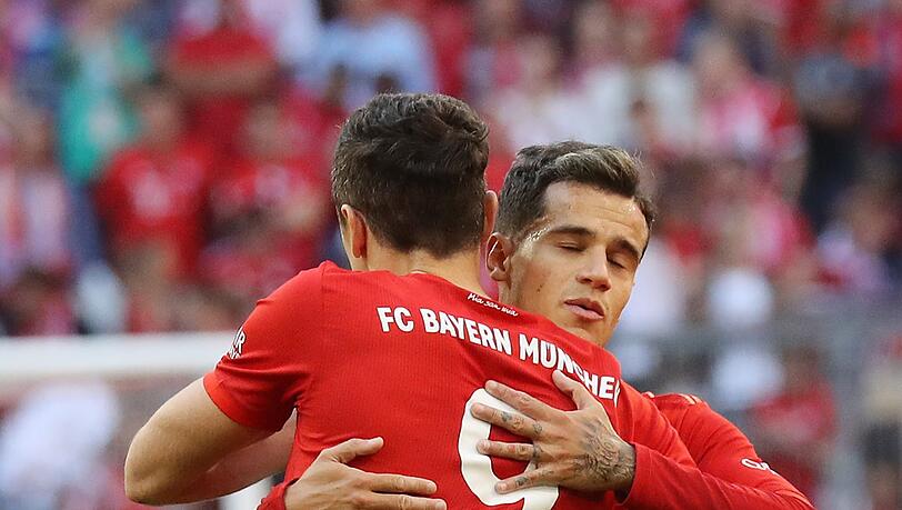 Ein Herz und eine Fußballerseele: Lewandowski (l.) und Coutinho. Ein Herz und eine Fußballerseele: Lewandowski (l.) und Coutinho.