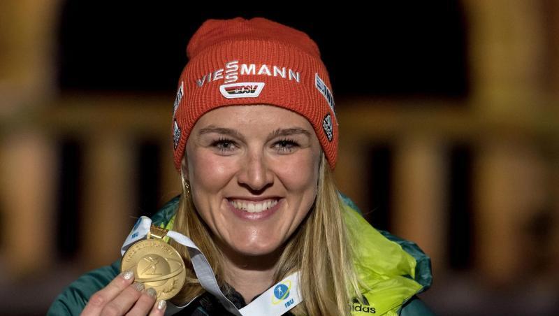 Glücklich: Denise Herrmann feiert ihr WM-Gold in Östersund. Glücklich: Denise Herrmann feiert ihr WM-Gold in Östersund.