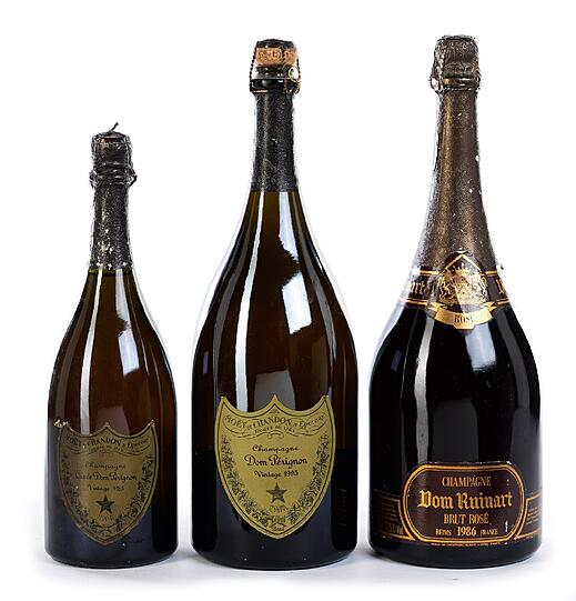 Drei Champagnerflaschen (u.a. Dom Ruinart 1986), Startpreis: 200 Euro.