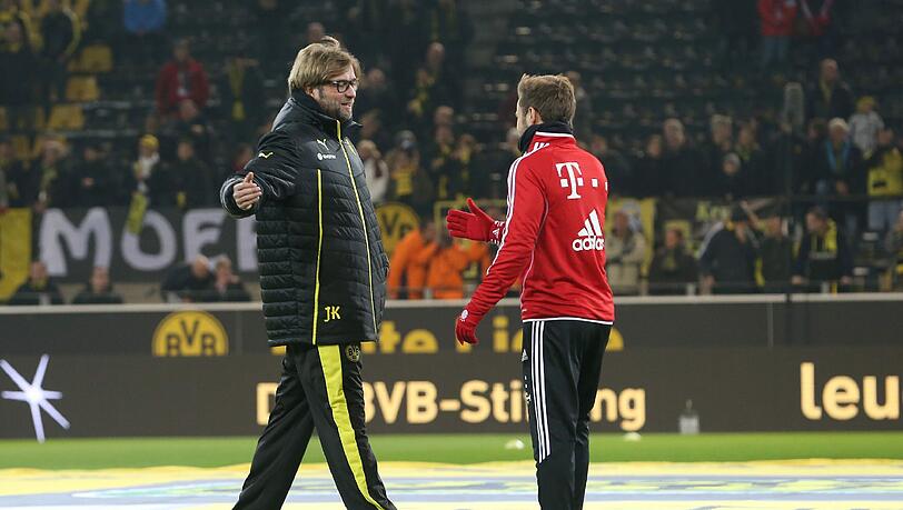 Professionell: Mario Götze trifft Ex-Trainer Jürgen Klopp. Professionell: Mario Götze trifft Ex-Trainer Jürgen Klopp.