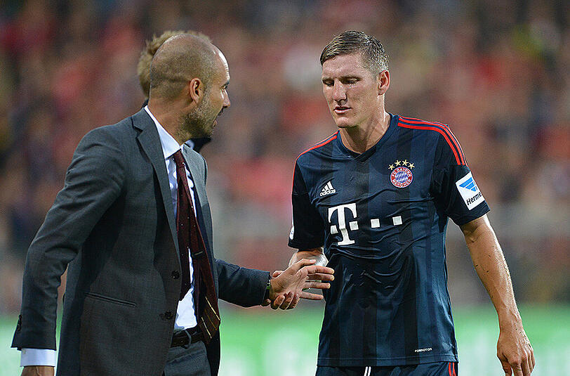 Der Lenker auf und der Denker neben dem Platz: Bastian Schweinsteiger (r.) und Pep Guardiola.