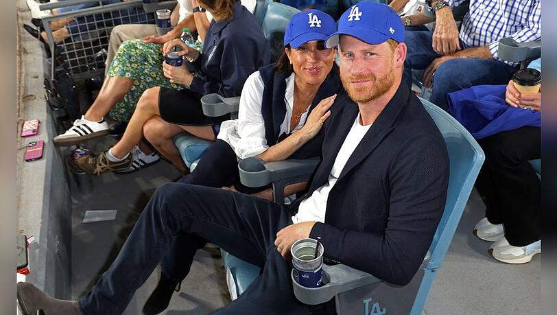 Auslöser des "Hatgate": Harry und Meghan mit L.A.-Kappen beim Baseball Auslöser des "Hatgate": Harry und Meghan mit L.A.-Kappen beim Baseball