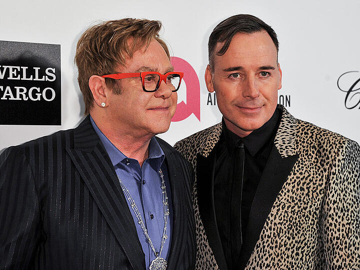 Top-Gastgeber: Elton John (l.) mit Ehemann David Furnish auf ihrer Oscar-Party 2014