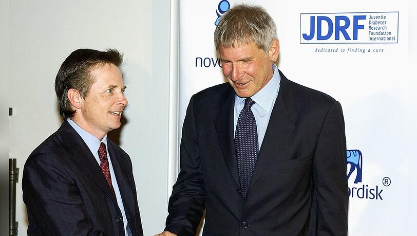 Harrison Ford (r.) und Michael J. Fox bei einem gemeinsamen Auftritt im Jahr 2004.