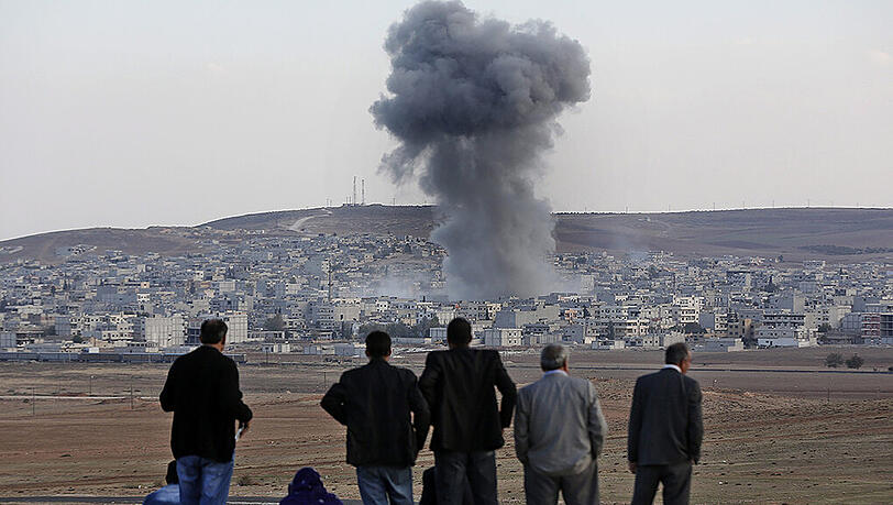 Eine heftige Explosion in Kobane. Eine heftige Explosion in Kobane.