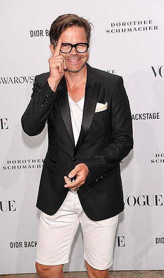 Modefotograf Kristian Schuller auf der Vogue Fashion Party.