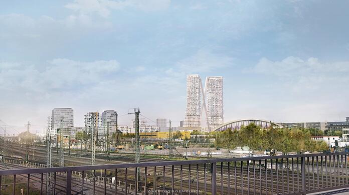 Von der Donnersbergerbrücke aus gesehen: hier die Simulation der geplanten Türme an der Paketposthalle mit zwei Außenaufzügen nahe der Gleise. Sie setzen einen Akzent im Stadtbild.