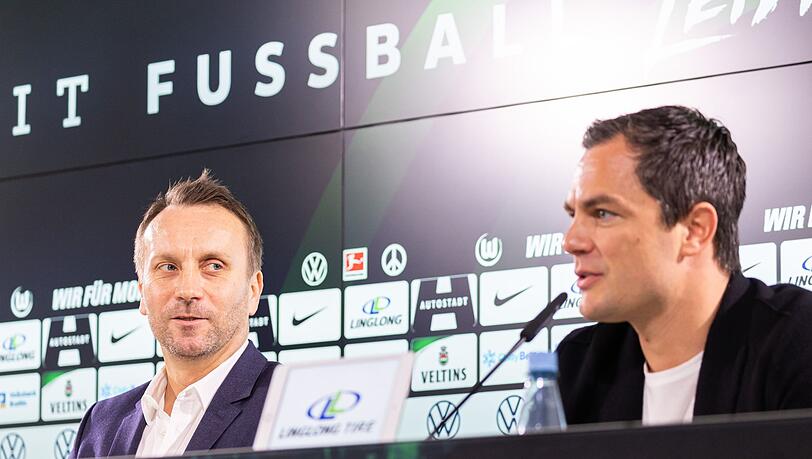 Wollen mit Wolfsburg ins europäische Geschäft: Sportdirketor Sebastian Schindzielorz (l) und Sport-Geschäftsführer Marcel Schäfer.