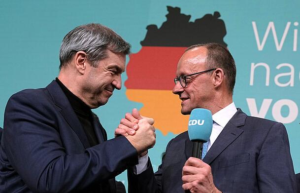 CSU-Chef Markus Söder und CDU-Chef Friedrich Merz in Feierlaune. CSU-Chef Markus Söder und CDU-Chef Friedrich Merz in Feierlaune.