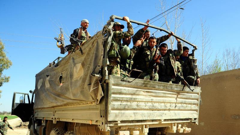 Syrische Soldaten in Ost-Ghuta. Die Entwicklung zeigt, wie sich nach dem angekündigten Truppenabzug der USA die Allianzen in Syrien neu sortieren. Syrische Soldaten in Ost-Ghuta. Die Entwicklung zeigt, wie sich nach dem angekündigten Truppenabzug der USA die Allianzen in Syrien neu sortieren.