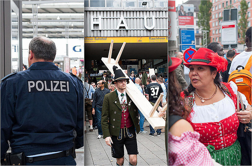 Flüchtlinge und Wiesn-Besucher treffen in München aufeinander, Bilder vom Hauptbahnhof am ersten Tag des Oktoberfests.