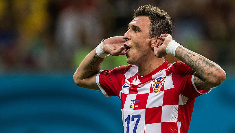 Mario Mandzukic jubelt über seine Tore für Kroatien gegen Kamerun. Mario Mandzukic jubelt über seine Tore für Kroatien gegen Kamerun.