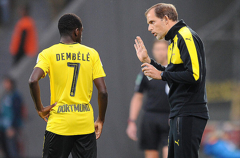 Ousmane Dembélé - hier mit BVB-Coach Thomas Tuchel - musste kurzfristig auf seinen Einsatz im EM-Qualifikationsspiel mit der französischen U21-Nationalmannschaft in Nordirland verzichten.