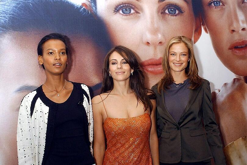 Platz 7: Caroly Murphy (r.) (3,6 Millionen US-Dollar), hier mit den Models Liz Hurley (Mitte) und Liya Kebede