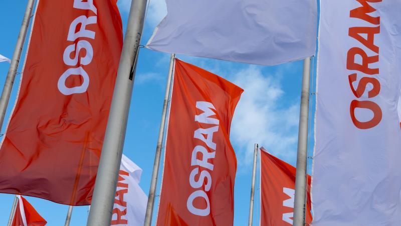Flaggen mit dem Logo von Osram wehen. Foto: Sven Hoppe/dpa Flaggen mit dem Logo von Osram wehen. Foto: Sven Hoppe/dpa