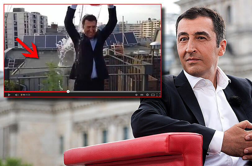 Grünen-Vorsitzender Cem Özdemir bestritt seine Ice Bucket Challenge neben einer Hanfpflanze.