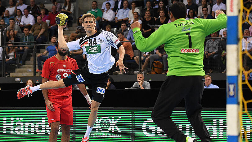 Deutschlands Linksaußen Rune Dahmke im Spiel gegen Tunesien. Deutschlands Linksaußen Rune Dahmke im Spiel gegen Tunesien.