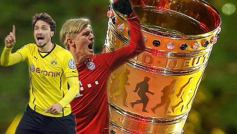 Mats Hummels (l) und Toni Kroos wollen ihn: Um diesen Pokal geht es beim Finale im Berliner Olympiastadion am 17. Mai Mats Hummels (l) und Toni Kroos wollen ihn: Um diesen Pokal geht es beim Finale im Berliner Olympiastadion am 17. Mai