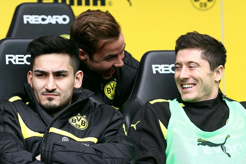 Sitzt Ilkay Gündogan (links) demnächst neben Robert Lewandowski (rechts) auf der Bayern-Bank, geht Mario Götze (Mitte) zum BVB zurück?