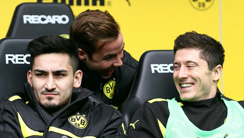 Sitzt Ilkay Gündogan (links) demnächst neben Robert Lewandowski (rechts) auf der Bayern-Bank, geht Mario Götze (Mitte) zum BVB zurück?