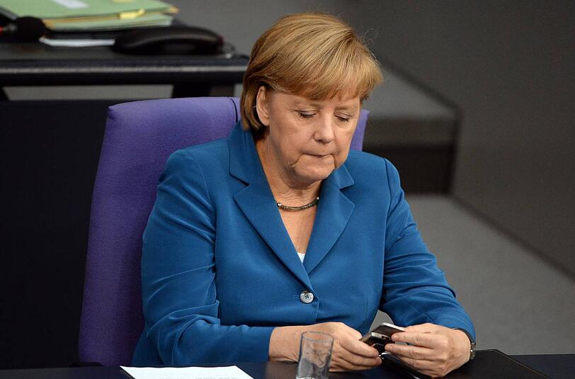 Kanzlerin Angela Merkel schreibt manchmal zwei Dutzend SMS pro Tag.