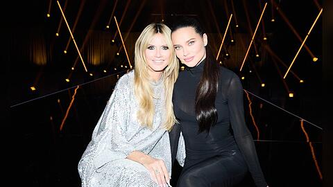 Haben ein Auge auf die Models: Heidi Klum und Adriana Lima.