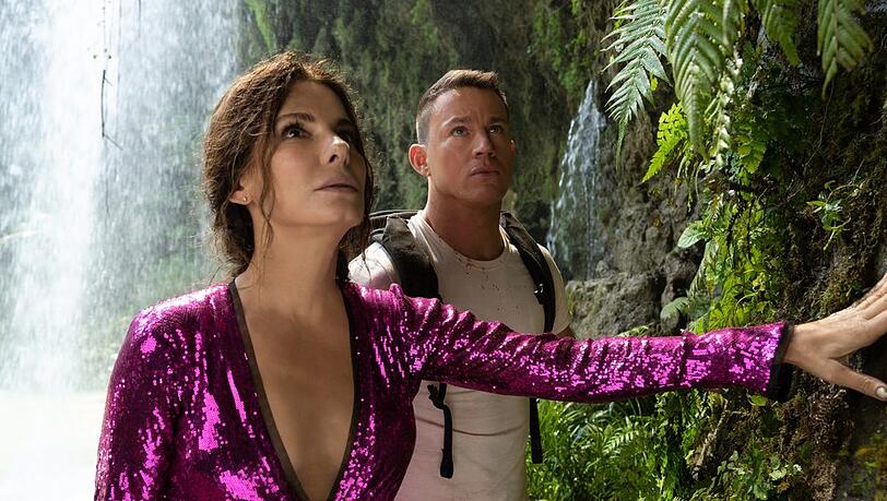 "The Lost City - Das Geheimnis der verlorenen Stadt": Loretta (Sandra Bullock, l.) und Alan (Channing Tatum) kommen im Dschungel einem Geheimnis auf die Spur. "The Lost City - Das Geheimnis der verlorenen Stadt": Loretta (Sandra Bullock, l.) und Alan (Channing Tatum) kommen im Dschungel einem Geheimnis auf die Spur.