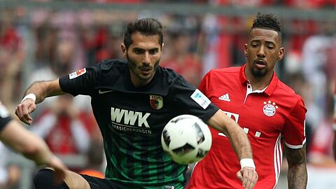 Hamit Altintop (l.) zu seiner aktiven Zeit im Zweikampf mit Jérômé Boateng