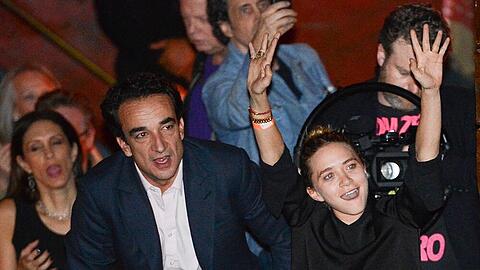 Olivier Sarkozy und Mary-Kate Olsen auf einem Konzert von Ron Wood