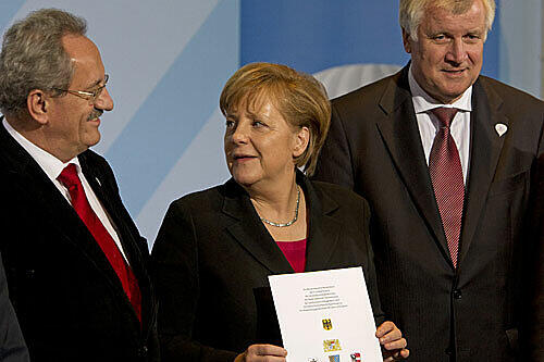 Christian Ude, Angela Merkel und Horst Seehofer vereint in Berlin