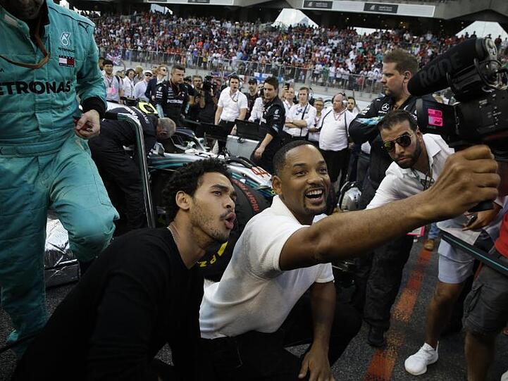 Ein glücklicher Moment: Will Smith und sein Sohn Trey beim Grand Prix von Abu Dhabi.
