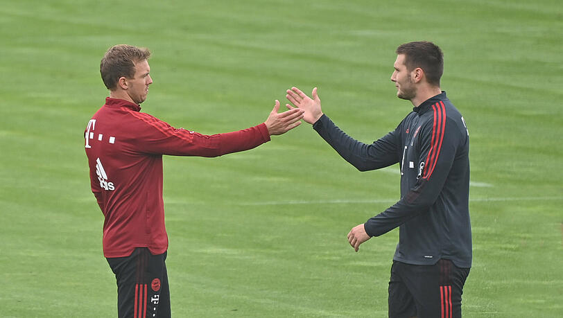 Julian Nagelsmann (l.) sieht in Niklas Süle (r.) großes Potenzial.