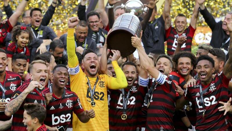 Die Spieler von Flamengo Rio de Janeiro feiern den Sieg der Copa Libertadores. Die Spieler von Flamengo Rio de Janeiro feiern den Sieg der Copa Libertadores.