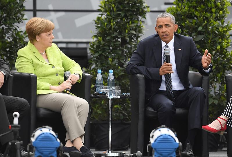 Bei Merkel und Obama: Ausgelassene Stimmung beim Kirchentag in Berlin