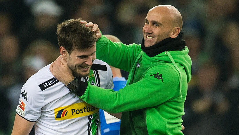 Trainer Andre Schubert (r) jubelt nach dem Spiel mit Havard Nordtveit Trainer Andre Schubert (r) jubelt nach dem Spiel mit Havard Nordtveit